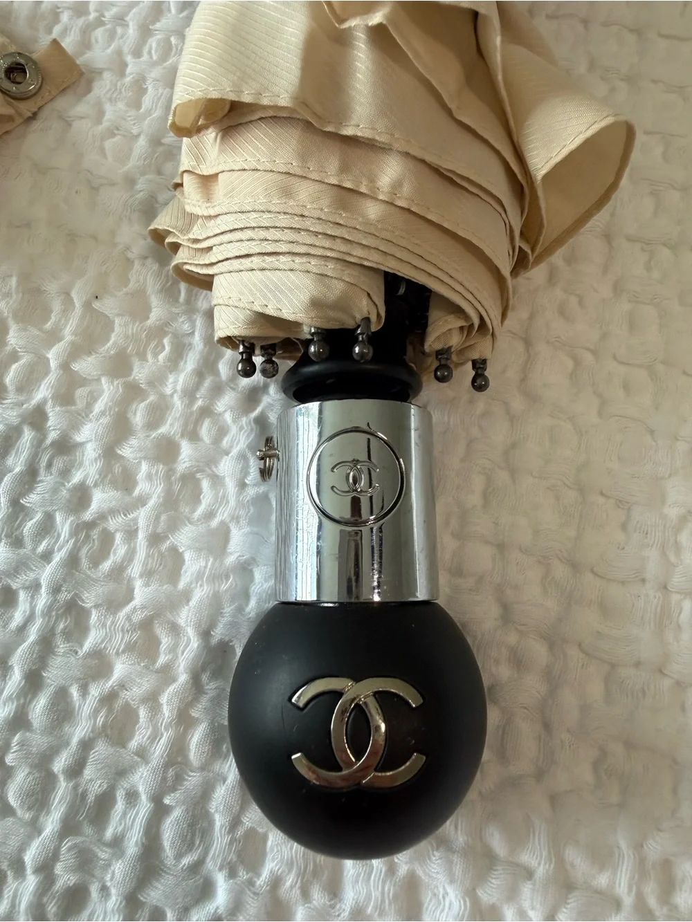 CHANEL Cream Compact Umbrella with Logo Accent